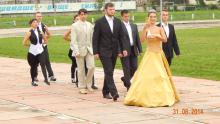 The Oil Queen accompanied by honor guards and musicians visited the matriculation